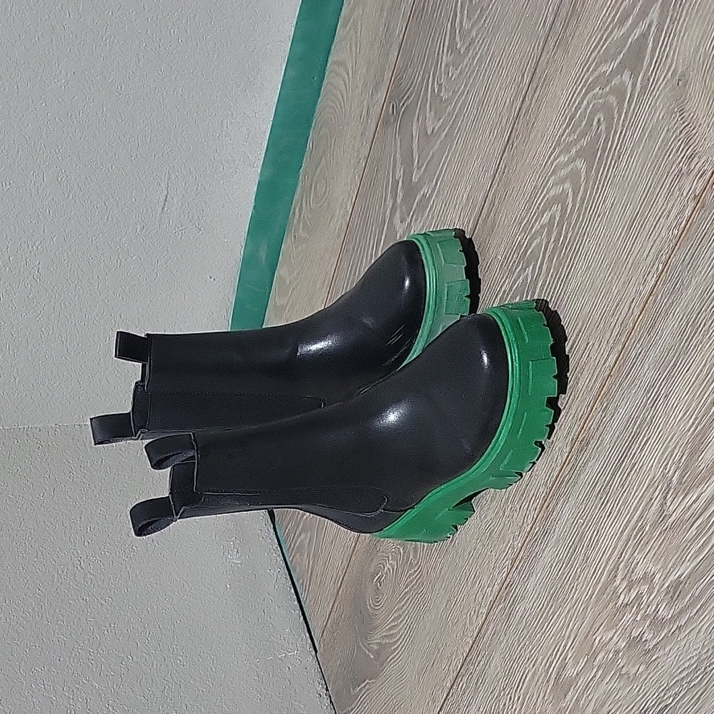 Black With green sole ankle rain booties.